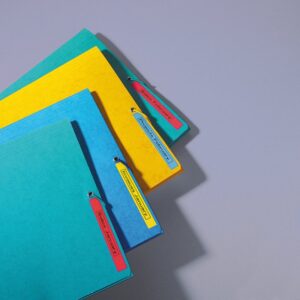 D1 - CINTAS DYMO 6MMX7M NEG/AMAR